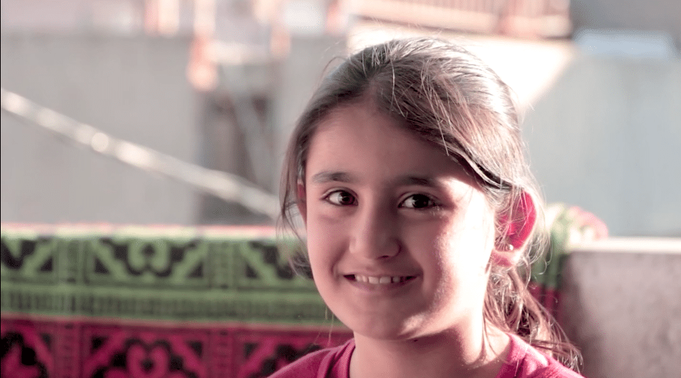 Hopeful Eyes Outside the Border